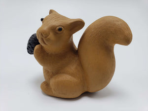Squirrel With A Pine Cone Clay Statue 